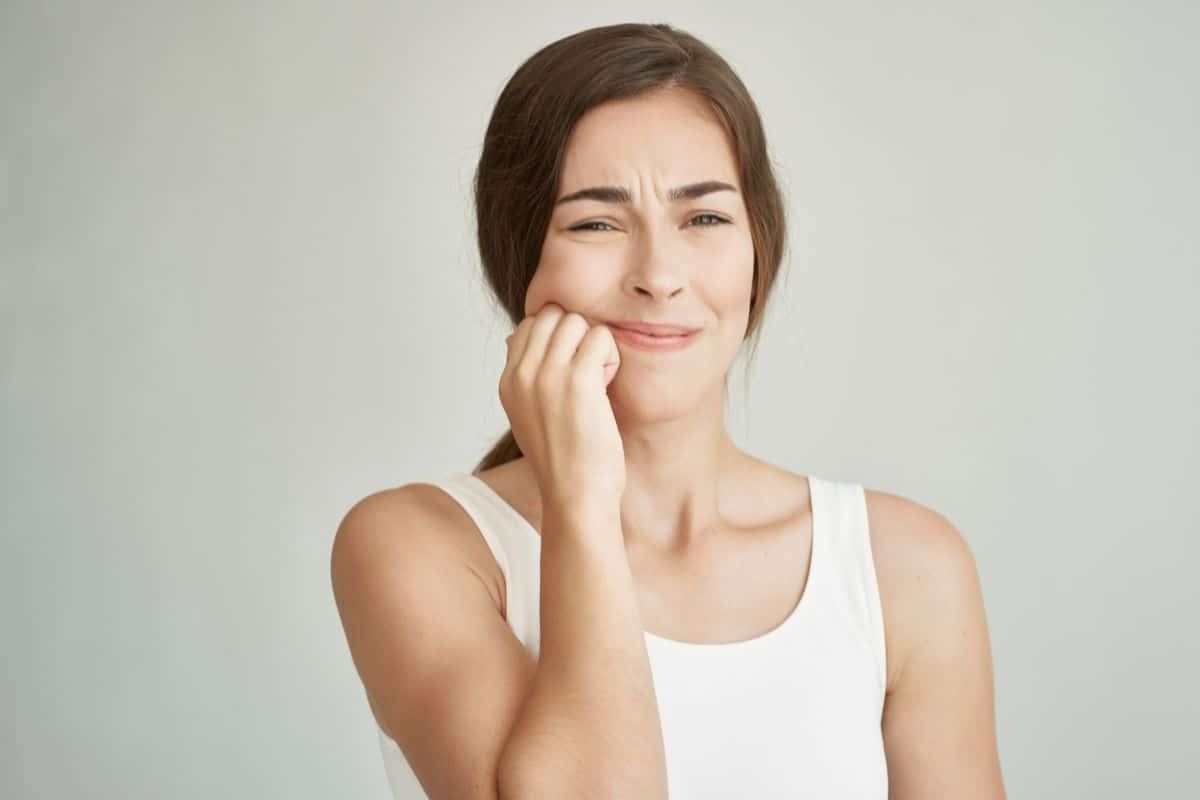 Woman from Gainesville, TX, suffering from intense toothache